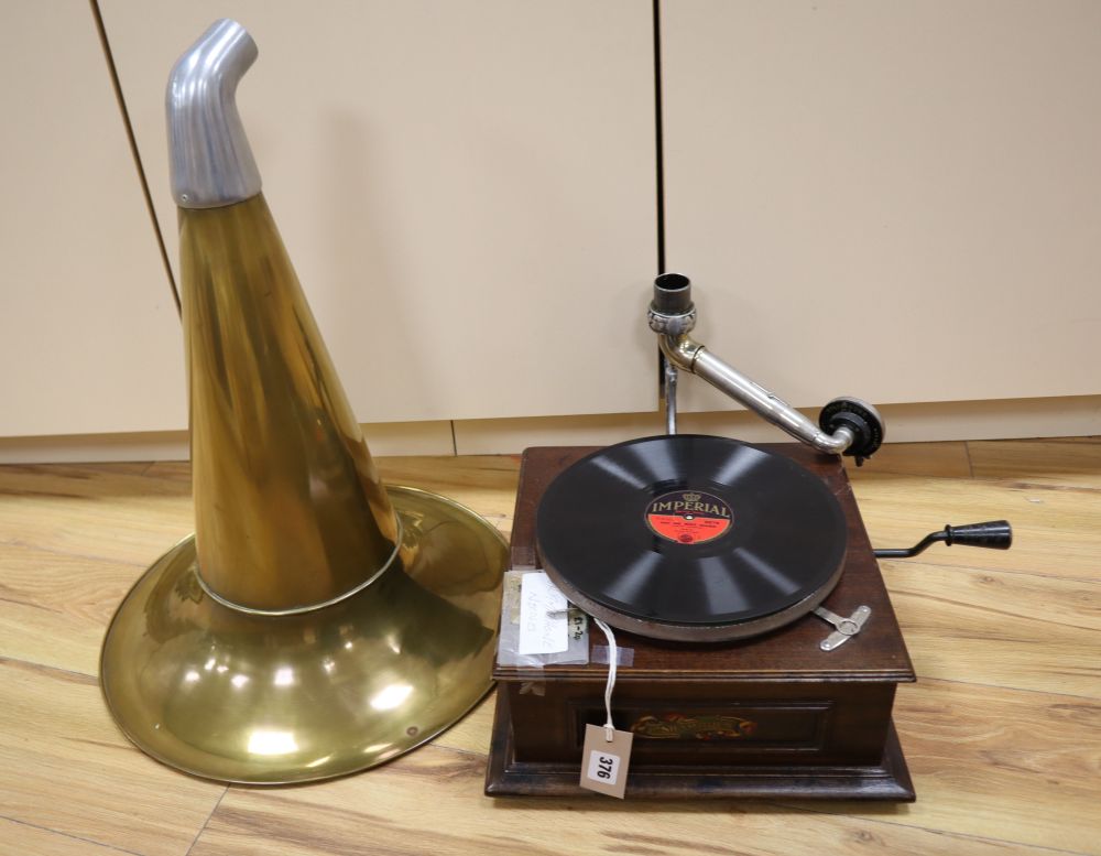 A table gramophone, The Shamrock, with horn, needles and two 78rpm records